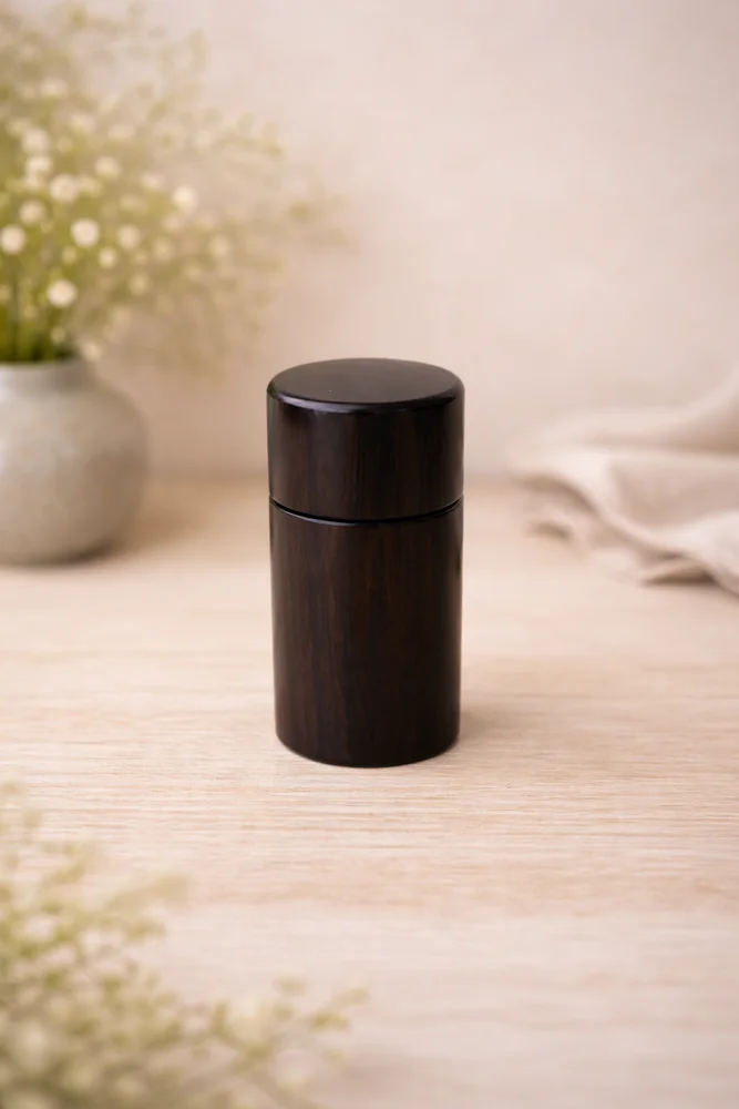 Dark wood cylinder urn