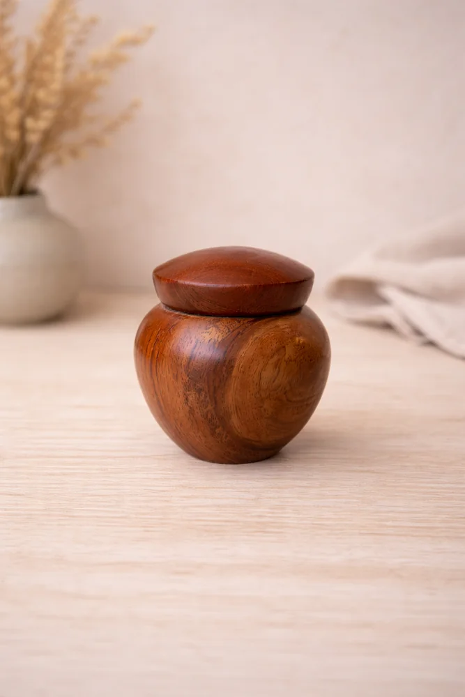 Traditional round wood urn